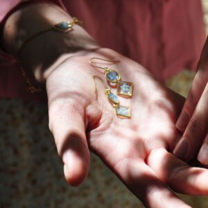 Linked forget me not flower dangles