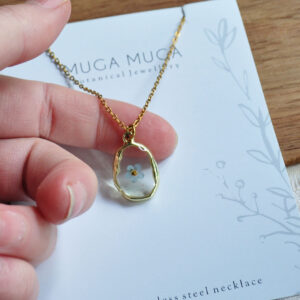 Organic forget-me-not pendant